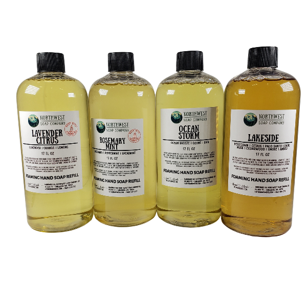 NW Soap Company Foaming hand soap refill bottles. Picture of four scents: Lavender Citrus,  Rosemary Mint, Ocean Storm, and Lakeside. 