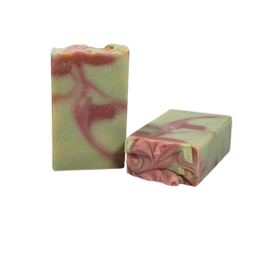 NW Soap Mimosas unwrapped bars of soap in greens, peach, and pinks.