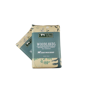 NW Soap wrapped bars of Woodlands in custom printed paper with forest trees and ferns.