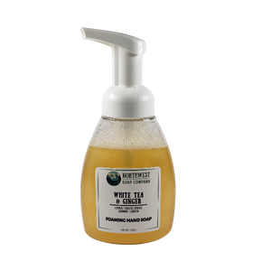 NW Soap Company front of White Tea and Ginger foaming hand soap in a table top foamer bottle. 