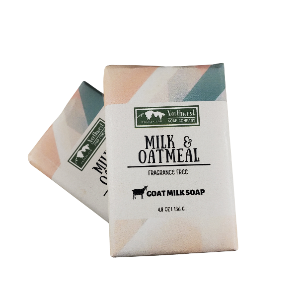 NW Soap Company two wrapped bars of Milk and Oatmeal goat milk soap in custom paper wrappers.