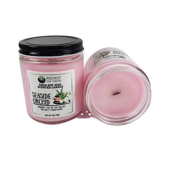 NW Soap Company Seaside Orchid coconut soy candle with wooden wick in glass jar with black lid. 