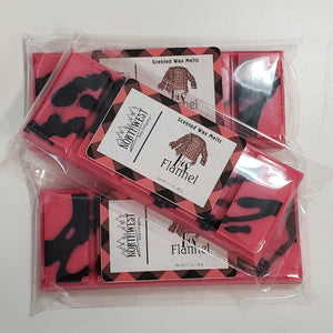 3 His Flannel Wax melts in their recyclable 5 PP wrappers.  Red with black drizzle.