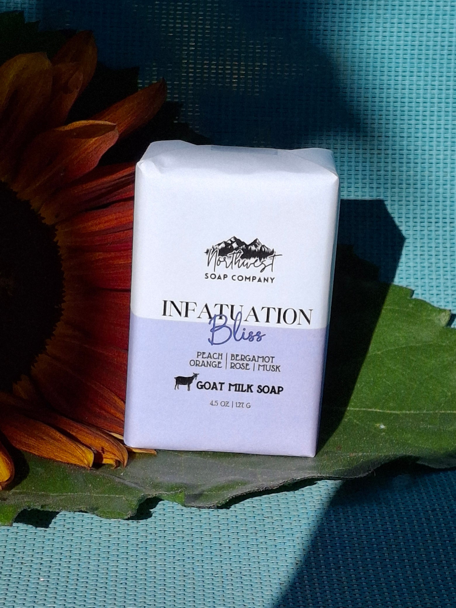 NW Soap Infatuation body bars unwrapped in pink and purples.