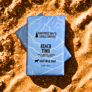 Bar of soap from Northwest Soap & Candle Company on sand