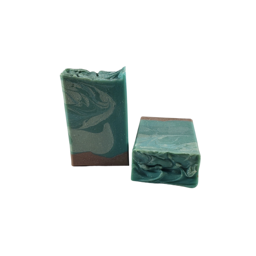 NW Soap two bars of Beach Time body bars unwrapped in turqoise and brown